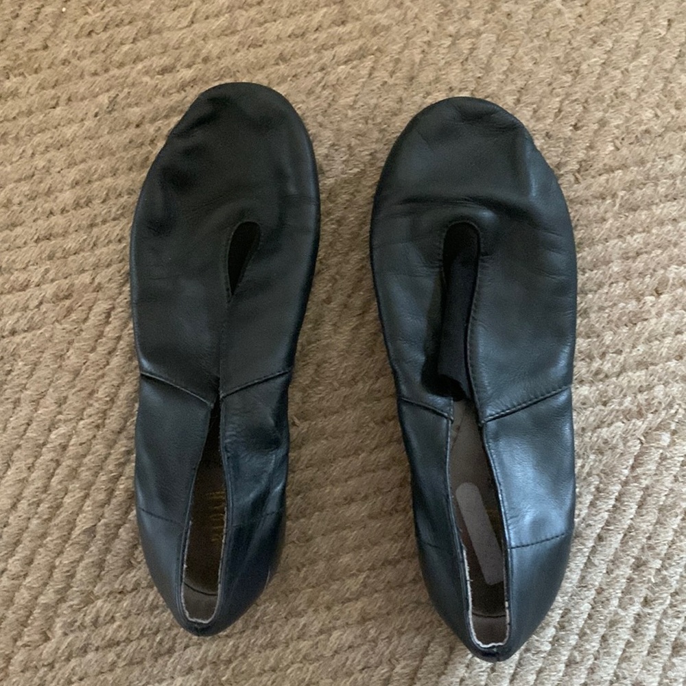 Bloch super jazz slip on.  No rips or tears